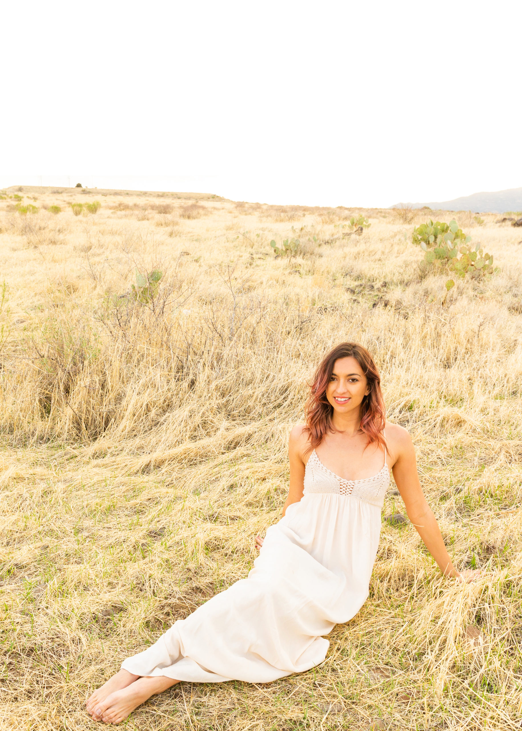 Golden hour glow during a dreamy desert sunset portrait session with model Amanda.