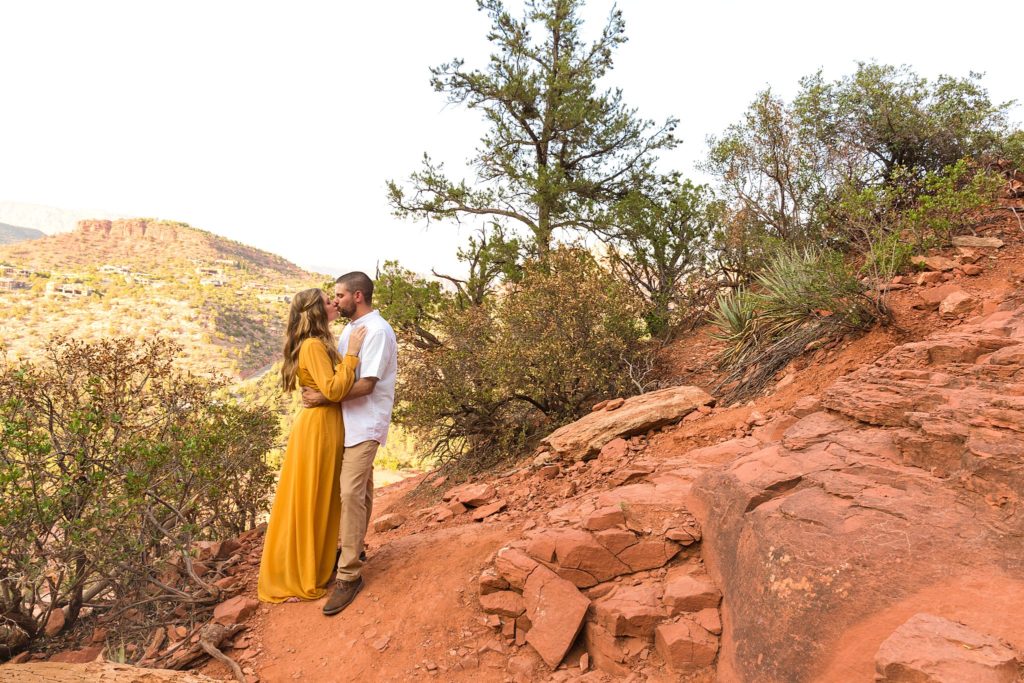 Bethany and Nick share a kiss during their Sedona, Arizona destination anniversary portrait session