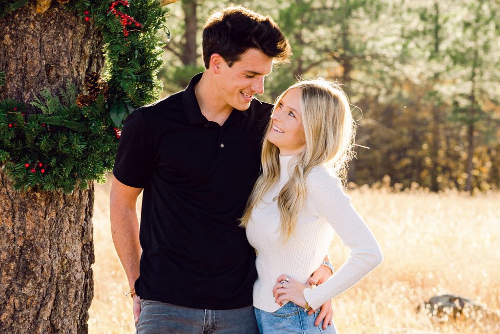 Clients Kirstin and Luke into each others eyes happily during a Flagstaff portrait session.