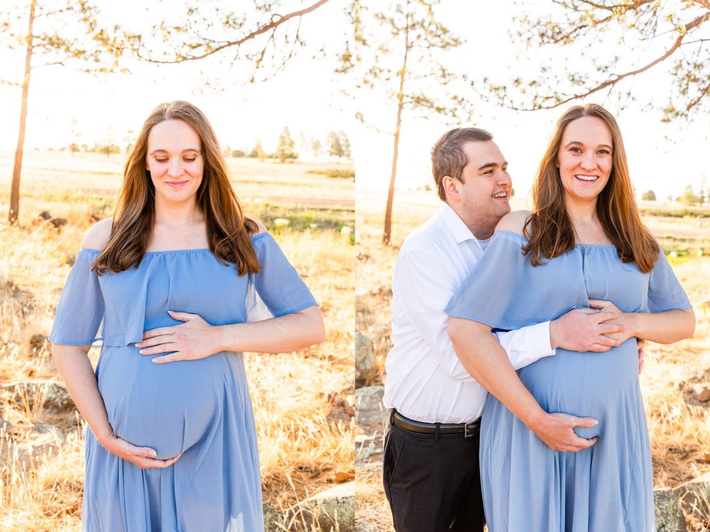 An expectant mother smiles softly down at baby cradling her stomach; husband smiles at expectant wife while cradling her stomach during a maternity portrait session in Flagstaff, Arizona. 