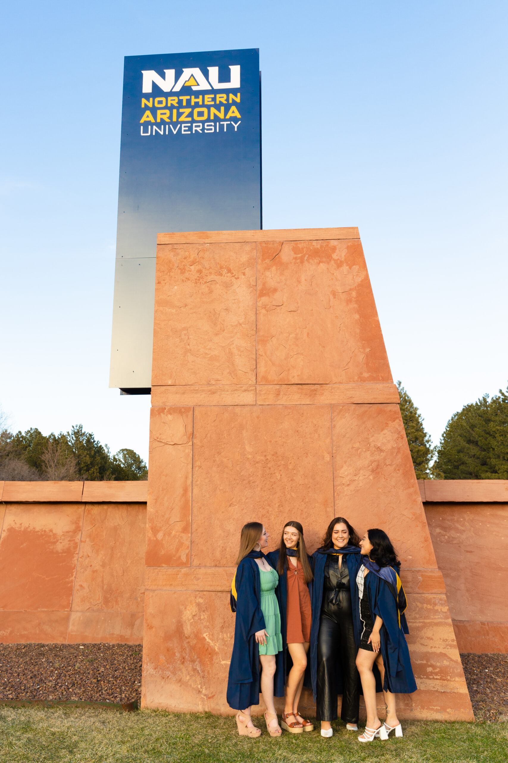 Image of Master's degree recipients at Northern Arizona University during a Flagstaff portrait session with Bayley Jordan Photography