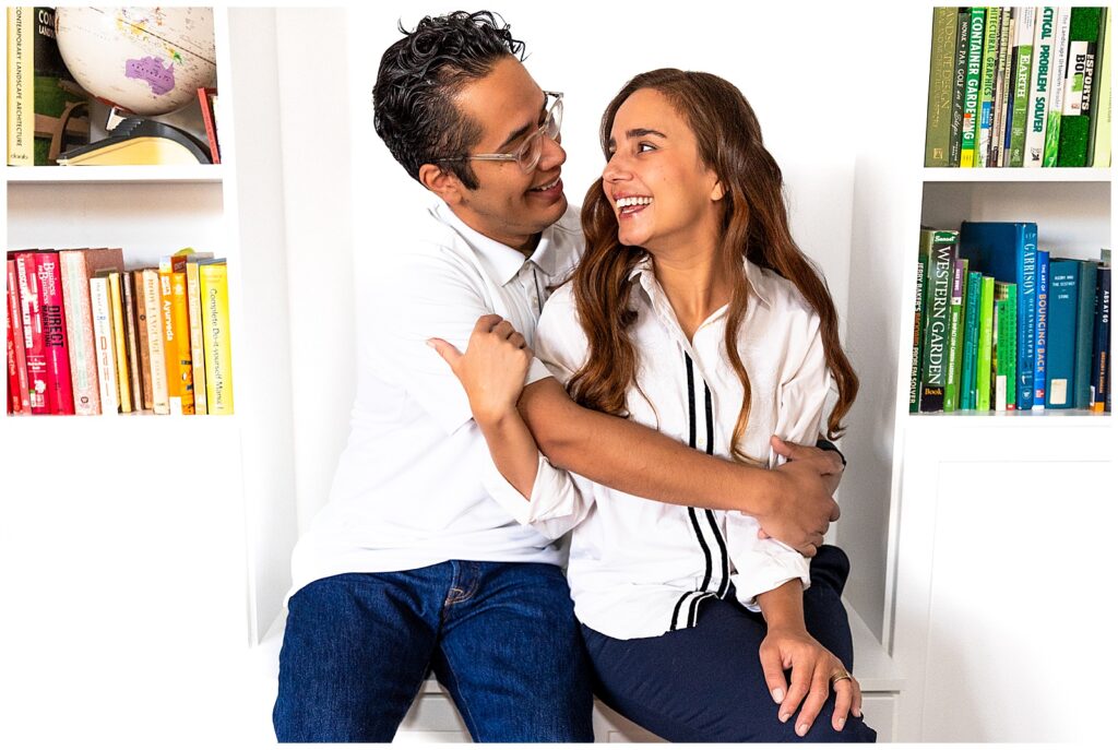 Jose and Brittany Acevedo, hosts of the Finding Arizona podcast, all smiles during a family portrait session in Phoenix with Bayley Jordan Photography.