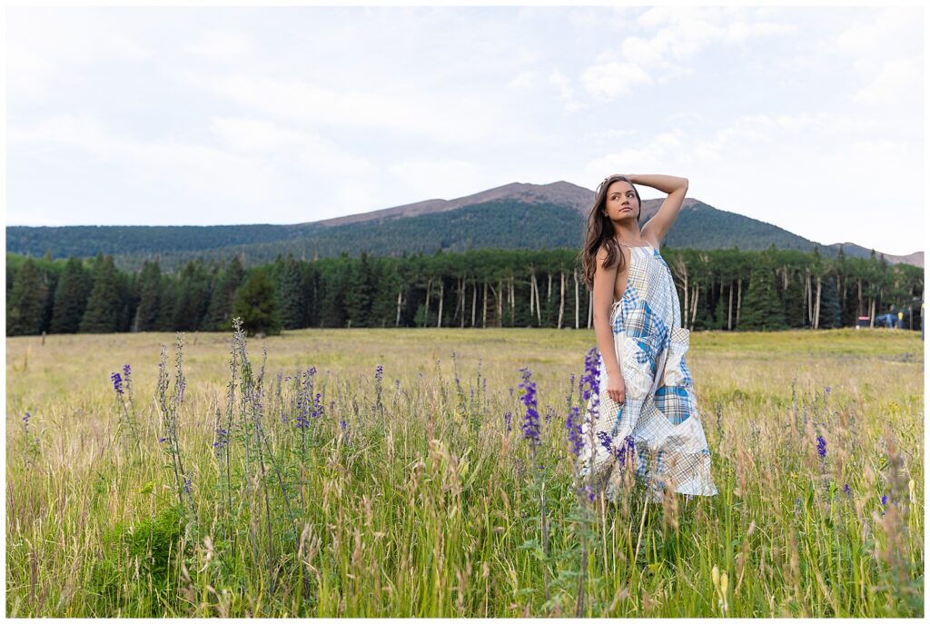 Holly stepped right out of a magazine in an editorial shot at the San Francisco Peaks in Flagstaff Arizona  during NAU graduation portraits with Bayley Jordan Photography