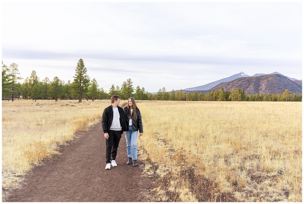 Jay and Ashley are all smiles after getting engaged at Buffalo Park in Flagstaff Arizona. 
